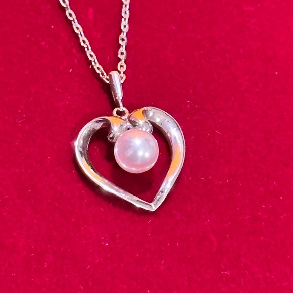 Mikimoto Silver Heart Necklace with Pearl
925 silver made. - Picture 10 of 12